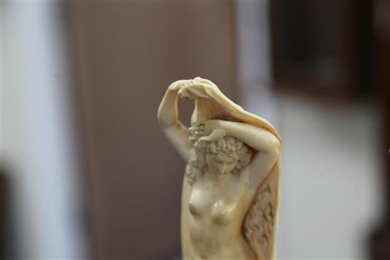 A pair of 19th century Dieppe ivory carvings of muses, Overall H. 12.25in.